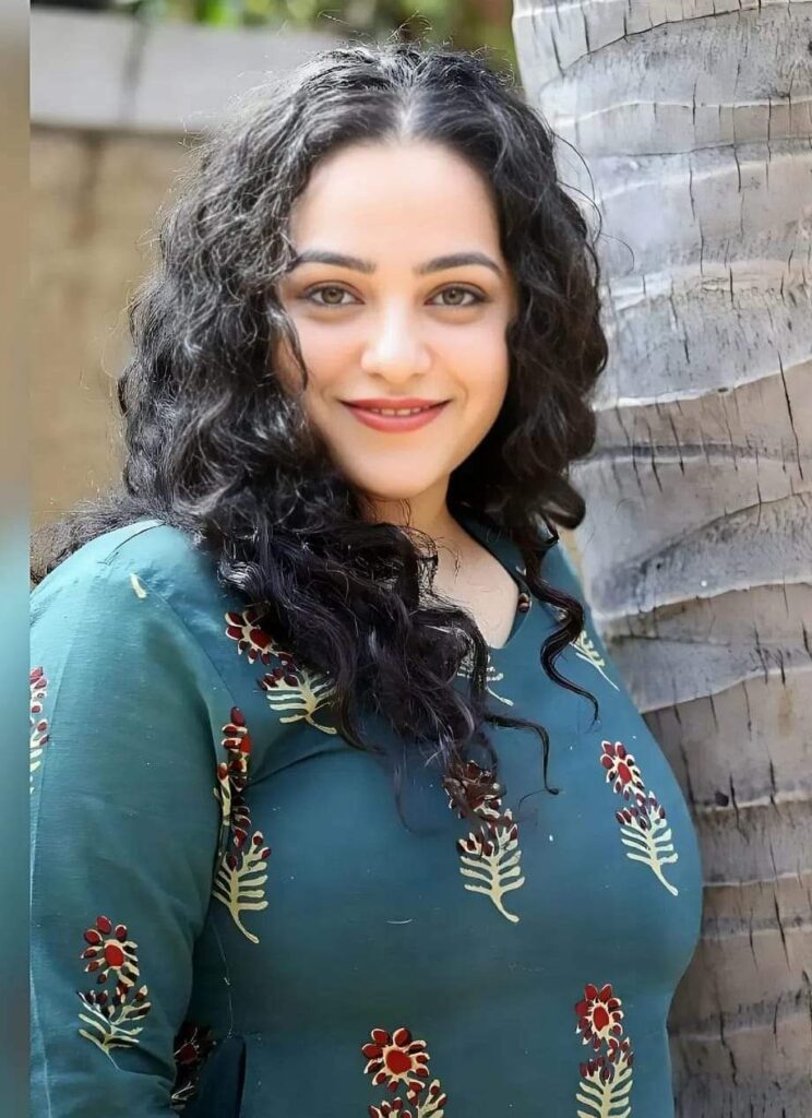 5 Best Glamorous Images of Nithya Menen, Top 5 Glamorous Photos of Nithya Menen, 5 Stunning Glamorous Looks of Nithya Menen, Nithya Menen's 5 Most Glamorous Images, 5 Gorgeous Glamorous Pictures of Nithya Menen, The Glamour of Nithya Menen: Top 5 Stunning Images, 