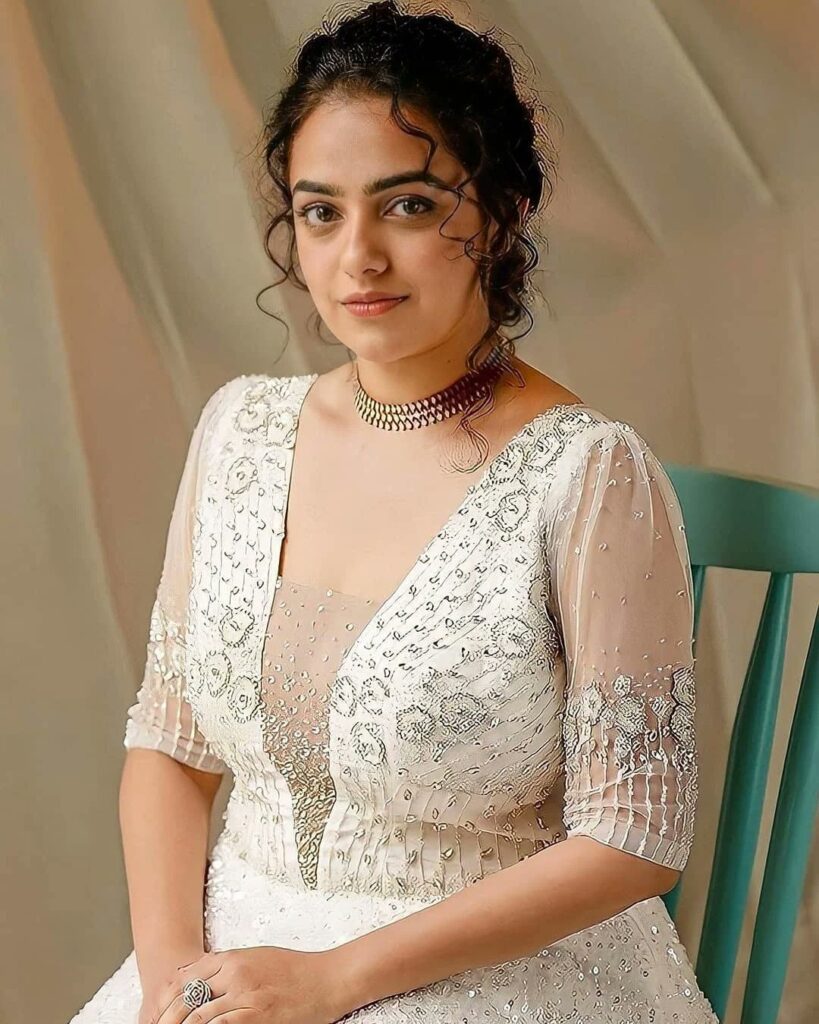 5 Best Glamorous Images of Nithya Menen, Top 5 Glamorous Photos of Nithya Menen, 5 Stunning Glamorous Looks of Nithya Menen, Nithya Menen's 5 Most Glamorous Images, 5 Gorgeous Glamorous Pictures of Nithya Menen, The Glamour of Nithya Menen: Top 5 Stunning Images, 